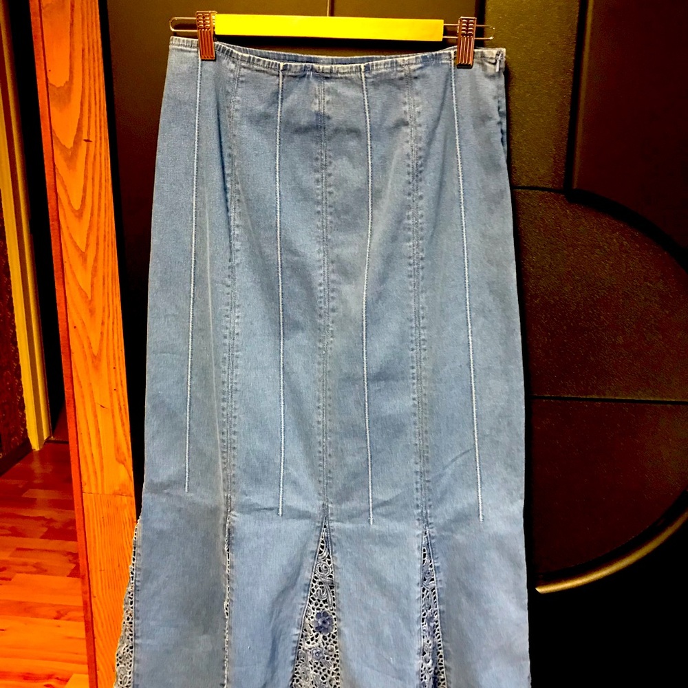 Denim skirt with decorative details and denim zip vest. Imported from Europe